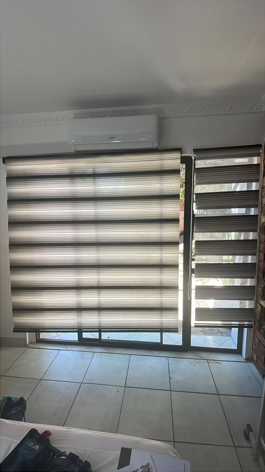 Bedroom window with blinds and study chair